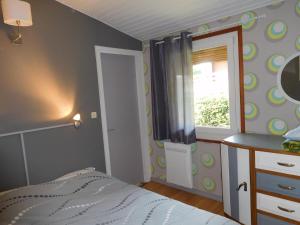 Voodi või voodid majutusasutuse Chalet Le Vintage toas