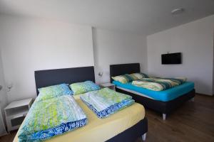 Letto o letti in una camera di Vulsa Apartmani