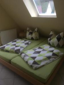 Кровать или кровати в номере Ferienappartements Anke Lange