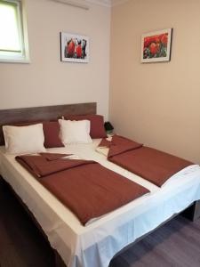 Posteľ alebo postele v izbe v ubytovaní My Home Apartman