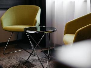 Posedenie v ubytovaní Q Hotel Plus Katowice