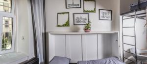Postel nebo postele na pokoji v ubytování Wake Up Wellness Hostel