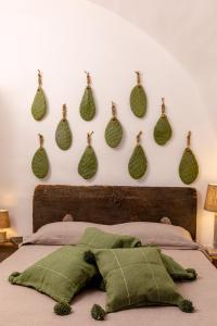 Postel nebo postele na pokoji v ubytování Alesia luxury suite Ostuni