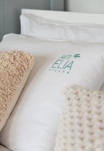 Postel nebo postele na pokoji v ubytování Akti Elia Villas Beachfront Chalkidiki