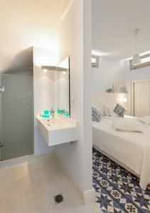 Postel nebo postele na pokoji v ubytování Akti Elia Villas Beachfront Chalkidiki