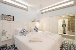 Postel nebo postele na pokoji v ubytování Akti Elia Villas Beachfront Chalkidiki