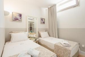 Postel nebo postele na pokoji v ubytování Akti Elia Villas Beachfront Chalkidiki