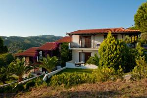 a house on top of a hill at Villa Anna Maria in Agia Paraskevi