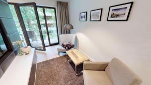 Posezení v ubytování White Pearl Apartment 1.10