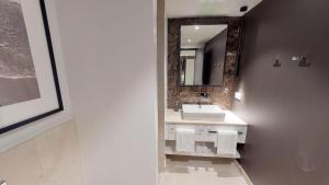 Koupelna v ubytování White Pearl Apartment 1.10