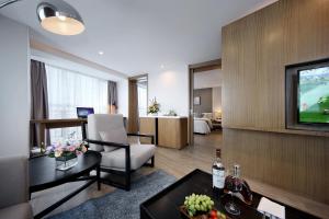 TV a/nebo společenská místnost v ubytování Hongdu Hotel
