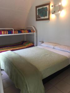 Postel nebo postele na pokoji v ubytování Casablanca Domes Trinity Beach