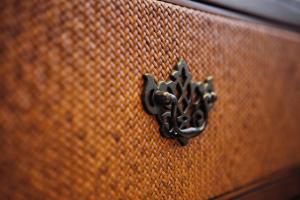 a close up of a suitcase with a metal latch at Butterfly on Wellington, Central in Hong Kong