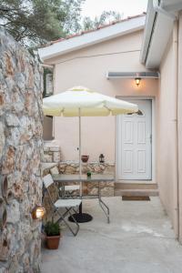 Patio nebo venkovní prostory v ubytování Camping & Rooms Kariotes