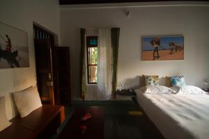 A bed or beds in a room at Villa Mia