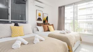 Ένα ή περισσότερα κρεβάτια σε δωμάτιο στο Hotel Apartment Ueno Inaricho Sta