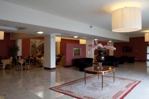 Lobbyn eller receptionsområdet på Hotel Maxim
