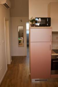 Kuchyň nebo kuchyňský kout v ubytování Geek Apartment