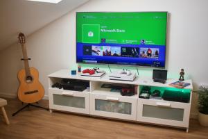 TV a/nebo společenská místnost v ubytování Geek Apartment