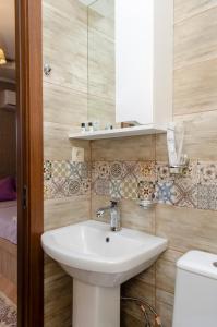 Koupelna v ubytování Hotel S.R