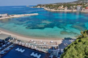 a large body of water with a beach at Hôtel & Spa Île Rousse Bandol by Thalazur in Bandol