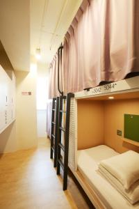 Postel nebo postele na pokoji v ubytování Loosha Hostel