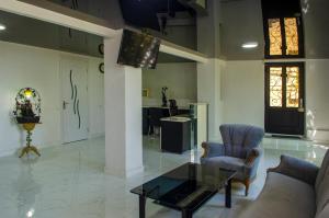 TV a/nebo společenská místnost v ubytování Hotel S.R