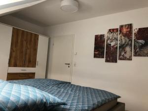 Ein Bett oder Betten in einem Zimmer der Unterkunft Dreihof Brandenburg