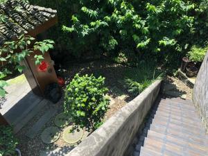 Taman di luar Wang Jiang Reclusive Boutique Inn