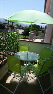 A balcony or terrace at Adige Apartment