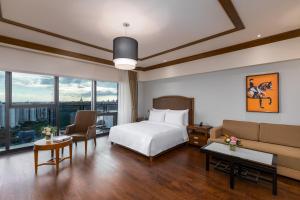 Katil atau katil-katil dalam bilik di Kantharyar Serviced Apartment