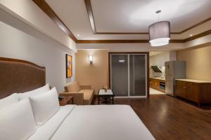 Katil atau katil-katil dalam bilik di Kantharyar Serviced Apartment