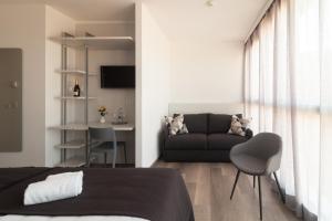 A seating area at Hotel Albergo Milano