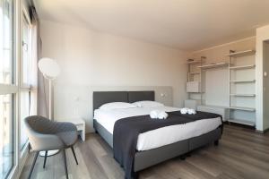 Llit o llits en una habitació de Hotel Albergo Milano