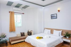 Postel nebo postele na pokoji v ubytování H79 HOTEL