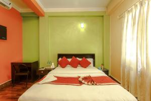 Postel nebo postele na pokoji v ubytování Hotel Nepalaya