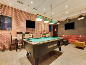 Biliár nebo kulečník v ubytování Action Hotel Ras Al Khaimah