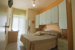 Postel nebo postele na pokoji v ubytování Hotel Solidea