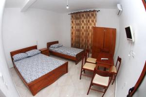 TV/trung tâm giải trí tại Isufi Guest Houses