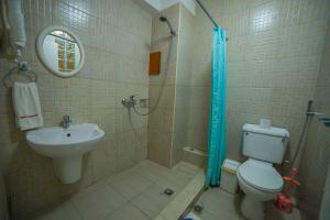 Koupelna v ubytování Eureka Place Hotel Kampala