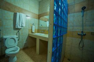 Koupelna v ubytování Eureka Place Hotel Kampala