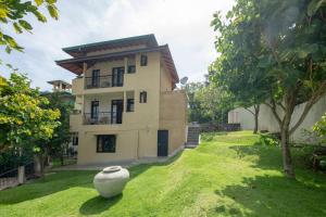 Zahrada ubytování Melheim Kandy Villas