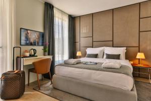 Postel nebo postele na pokoji v ubytování Avanti Hotel & Spa