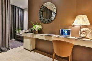 TV a/nebo společenská místnost v ubytování Avanti Hotel & Spa