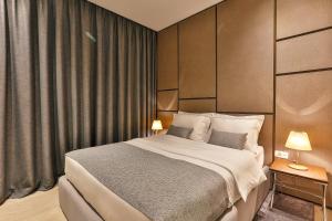 Postel nebo postele na pokoji v ubytování Avanti Hotel & Spa