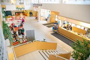 an overhead view of a shopping mall with people in a store at Hotel Norrvalla in Vöyri