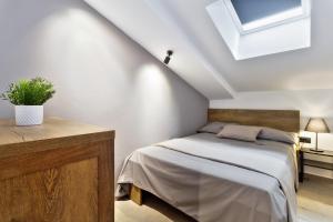 Postel nebo postele na pokoji v ubytování Apartments Vera