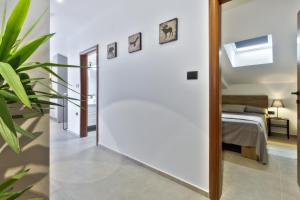 Postel nebo postele na pokoji v ubytování Apartments Vera
