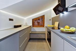 Kuchyň nebo kuchyňský kout v ubytování Apartments Vera