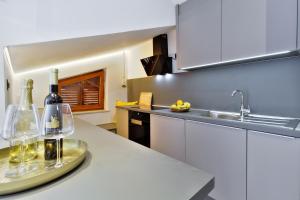 Kuchyň nebo kuchyňský kout v ubytování Apartments Vera